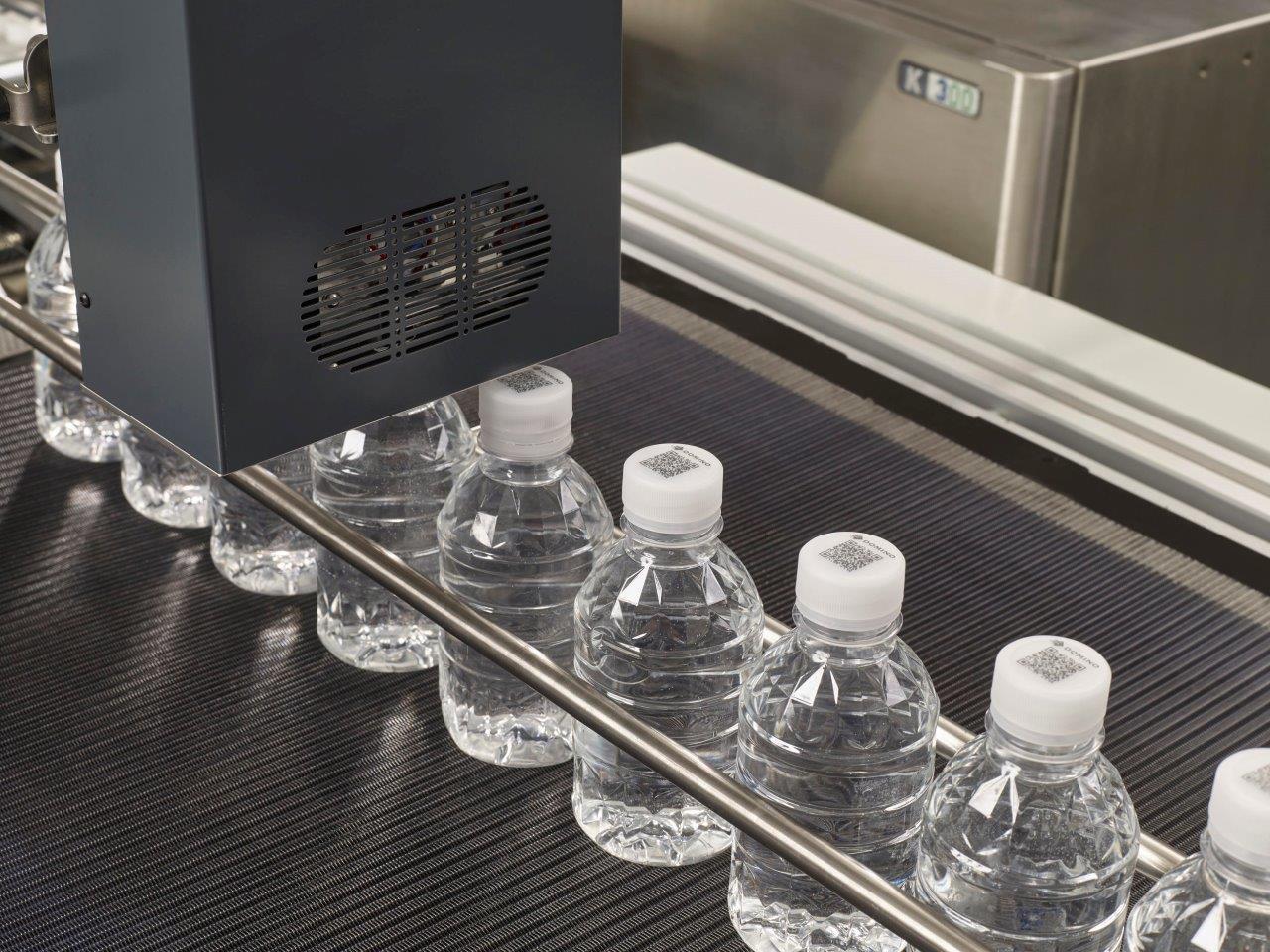 Domino_PPWR_ K300_bottle_cap_production_line