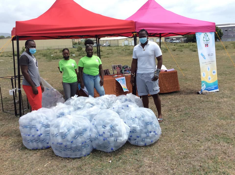 collection point with team banner and bottles