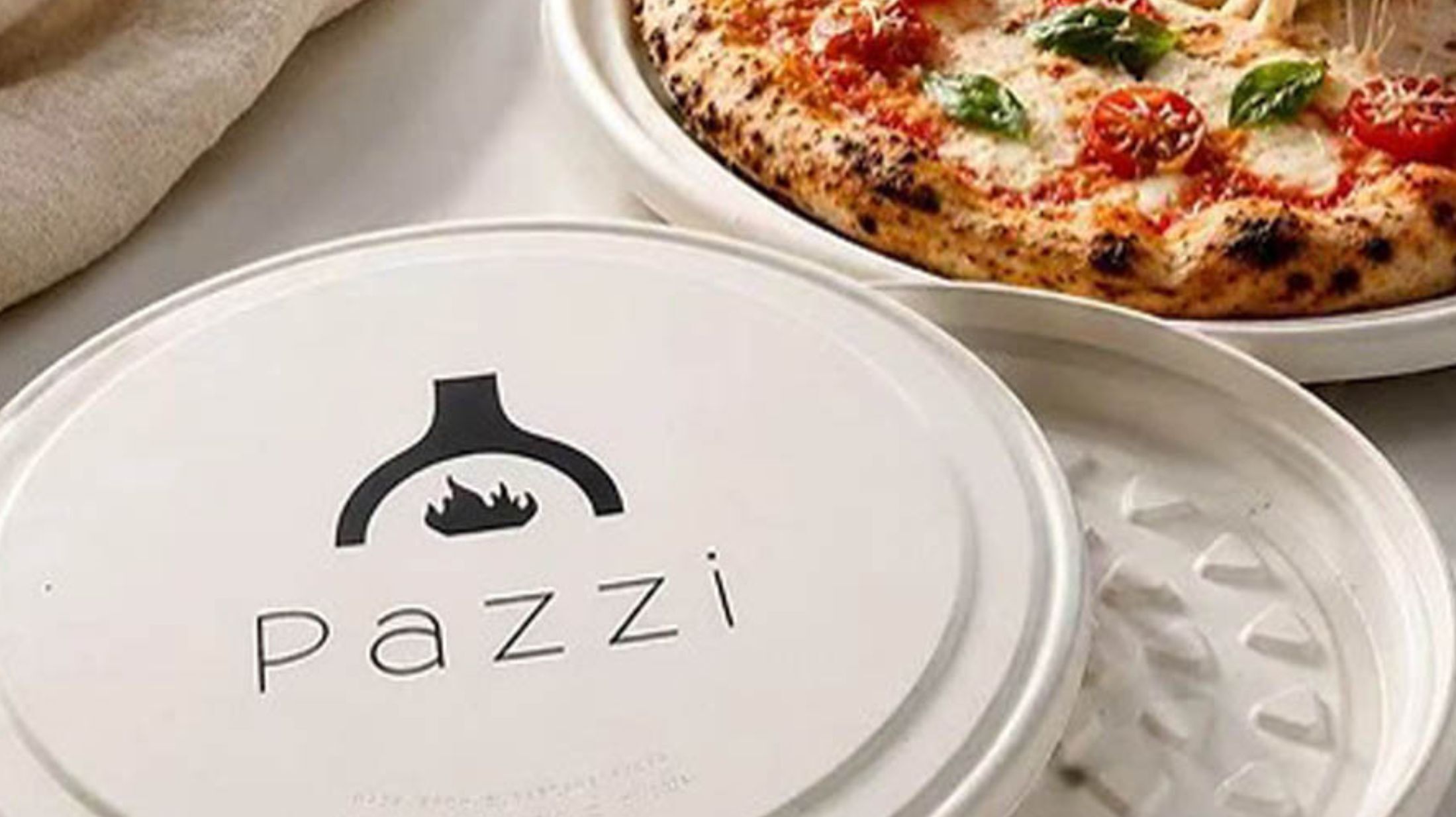 Blastiq ontwikkelt ronde pizzaverpakking van bagasse met PFAS-vrije PHA-coating