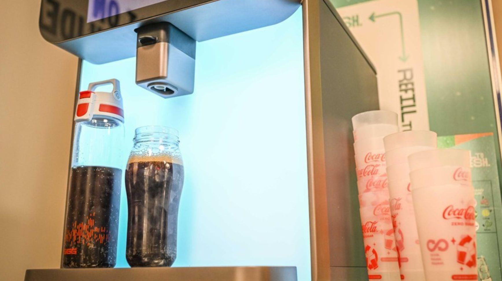 Coca-Cola lanceert volgend jaar een hervulbaar systeem waarbij de consument frisdrank koopt zonder verpakking